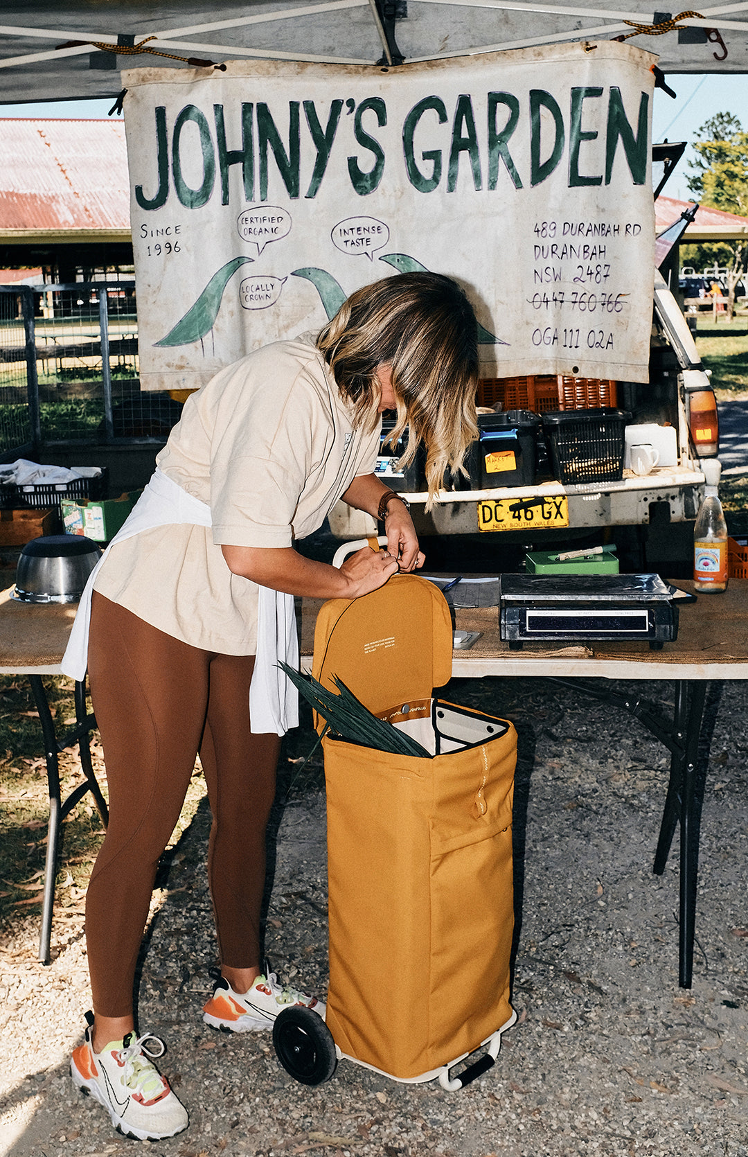 joyrolla shoppibg cart being used at a local farmers market