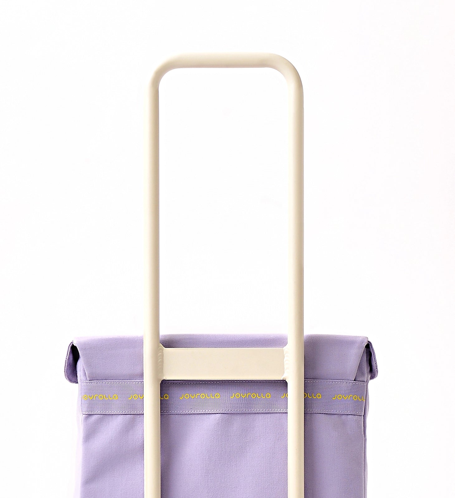 A close up view of the Joyrolla Cart and bag featuring logo repeats in yellow. 