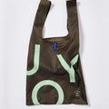 A durable, olive-colored reusable shopping bag with reinforced handles and a spacious interior. The bag is made from eco-friendly materials and features a simple yet stylish design. It can be folded and easily carried, making it a convenient choice for grocery shopping, errands, or any other daily activities