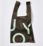 A durable, olive-colored reusable shopping bag with reinforced handles and a spacious interior. The bag is made from eco-friendly materials and features a simple yet stylish design. It can be folded and easily carried, making it a convenient choice for grocery shopping, errands, or any other daily activities